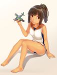 1girl airplane barefoot brown_eyes brown_hair dabadhi highres i-401_(kantai_collection) kantai_collection looking_at_viewer ponytail sailor_collar school_swimsuit school_uniform short_hair sitting smile solo swimsuit swimsuit_under_clothes tan tanline 