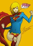 1girl blonde_hair blue_eyes cape clenched_hands dated dc_comics highres navel signature solo supergirl superhero tryvor 