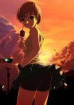  1girl bike_shorts black_bike_shorts brown_eyes brown_hair cloud clouds from_behind kebab lamppost leaning_forward looking_back pantylines persona persona_4 satonaka_chie short_hair skirt skirt_lift sky solo streetlights sunset sweat tasaka_shinnosuke telephone_pole traffic_light twilight wind_lift wristband 