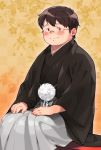  1boy brown_eyes brown_hair checkered checkered_background glasses gradient gradient_background hakama highres japanese_clothes male_focus new_year original pom_pom_(clothes) short_hair simple_background sitting smile solo tanaka_(tanakasunsun) 