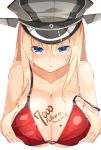  1girl bare_shoulders bikini bismarck_(kantai_collection) blonde_hair blue_eyes blush body_writing breast_hold breasts cleavage collarbone commentary_request hat hits kantai_collection large_breasts long_hair looking_at_viewer meth_(emethmeth) military_hat peaked_cap red_bikini solo swimsuit upper_body 