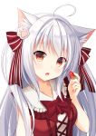  1girl :o ahoge animal_ears bow cat_ears food frills fruit hair_ornament hair_ribbon holding holding_fruit long_hair looking_at_viewer original paw_hair_ornament red_eyes ribbon solo strawberry sumikko_no_aria 
