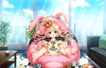  1girl artist_request barefoot blonde_hair blush bottle building candy chips clothes_writing clouds couch crown futaba_anzu game_console idolmaster idolmaster_cinderella_girls_starlight_stage long_hair looking_at_viewer official_art plant potted_plant shirt sitting sky skyscraper solo stuffed_animal stuffed_toy twintails yellow_shirt 