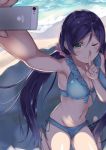  1girl absurdres bikini black_hair cellphone finger_to_mouth green_eyes highres long_hair love_live!_school_idol_project low_twintails one_eye_closed perspective phone qwyte self_shot swimsuit toujou_nozomi twintails 