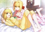  2girls absurdres ahoge barefoot blonde_hair bow breasts cleavage fate/extra fate/stay_night fate_(series) hair_bow highres indoors lying multiple_girls on_back on_bed on_stomach pajamas saber saber_extra scan smile takeuchi_takashi 
