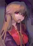  1girl ainy77 black_dress blonde_hair chinese_clothes dress hair_between_eyes hair_in_mouth hat junko_(touhou) long_hair long_sleeves looking_at_viewer mouth_hold red_eyes solo tabard touhou upper_body very_long_hair wide_sleeves 