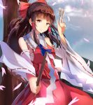  1girl ascot bare_shoulders bow brown_eyes brown_hair clouds cloudy_sky detached_sleeves dress gohei hair_bow hair_tubes hakurei_reimu highres hizagawa_rau long_hair long_sleeves looking_at_viewer petals red_bow red_dress sarashi sky smile solo spell_card touhou tree wide_sleeves 