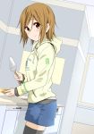  1girl alternate_hairstyle blush brown_eyes brown_hair casual cooking cowboy_shot denim_skirt dresstrip dutch_angle hair_down hood hoodie k-on! kitchen looking_at_viewer miniskirt profile short_hair skirt smile solo tainaka_ritsu thigh-highs zettai_ryouiki 