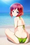  1girl ass back bangs beach bikini blue_sky closed_mouth from_behind green_bikini halterneck looking_at_viewer love_live!_school_idol_project nishikino_maki ocean on_ground outdoors sand sky smile solo string_bikini sunlight swimsuit tomomimi_shimon violet_eyes 