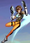  1girl bodysuit brown_hair dual_wielding female finalcake gloves goggles grin gun handgun highres jacket overwatch short_hair smile solo spiky_hair tracer_(overwatch) weapon 