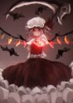  1girl absurdres arm_behind_back bat blurry depth_of_field flandre_scarlet glowing glowing_eyes hat highres light_smile looking_at_viewer mob_cap outstretched_arm red_eyes rotain scythe shirt skirt skirt_set solo touhou wings 