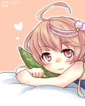  1girl :3 ahoge akapocho bitter_melon blush hair_ornament heart highres i-58_(kantai_collection) kantai_collection looking_at_viewer object_namesake on_bed pink_eyes pink_hair school_swimsuit short_hair solo swimsuit 