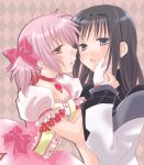  2girls akemi_homura argyle argyle_background black_eyes black_hair bow choker frilled_sleeves frills gem gloves hair_bow hairband hand_on_another&#039;s_cheek hand_on_another&#039;s_face hirota_kaoru incipient_kiss kaname_madoka long_sleeves mahou_shoujo_madoka_magica multiple_girls pink_background pink_bow pink_hair puffy_short_sleeves puffy_sleeves ribbon_choker short_sleeves simple_background twintails white_gloves yuri 