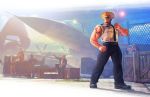  absurdres biceps blonde_hair box capcom fighting_stance guile highres manly necktie official_art radio sleeves_rolled_up solo_focus street_fighter street_fighter_v sunglasses tattoo 