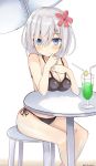  1girl bikini black_swimsuit blue_eyes breasts commentary_request drink flower hair_flower hair_ornament hamakaze_(kantai_collection) highres kantai_collection large_breasts pinoaisu silver_hair solo swimsuit 