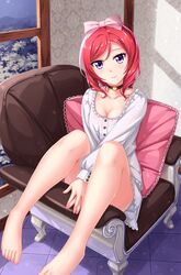  1girl barefoot blush bow breasts cleavage hair_bow highres looking_at_viewer love_live!_school_idol_project nishikino_maki redhead short_hair smile solo tucana violet_eyes 