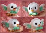 artist_name beak bird hands highres multiple_views open_mouth outstretched_arms owl photo piquipauparro pokemon pokemon_(creature) pokemon_(game) pokemon_sm rowlet stuffed_animal stuffed_bird stuffed_toy watermark web_address 