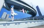  1girl aqua_eyes aqua_hair arms_behind_back bow building casual city dated dress from_behind hair_bow hair_over_eyes hatsune_miku high_heels lamppost long_hair looking_afar looking_to_the_side ramii road scenery signature sky solo street sundress tree twintails vocaloid white_dres wind 
