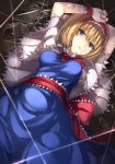  1girl alice_margatroid arms_up ascot blonde_hair blue_dress blue_eyes blush broken_glass dress glass hairband janne_cherry lolita_hairband looking_at_viewer lying on_back red_ribbon ribbon sash short_hair solo string string_around_finger touhou wrist_cuffs 