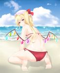  1girl ass back barefoot beach bikini blonde_hair blue_sky blush clouds crystal flandre_scarlet full_body hat hat_ribbon highres looking_at_viewer looking_back mob_cap ocean red_bikini red_eyes ribbon sand side_ponytail sitting sky smile solo sparkle surota swimsuit touhou wings 