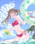  1girl bikini brown_hair flip-flops frilled_bikini frills green_eyes holding holding_shoes innertube kagawa_yuusaku long_hair navel open_mouth original palm_tree revision sandals sandals_removed shoes side-tie_bikini sky solo swimsuit tree twintails water 