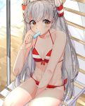  1girl alternate_costume amatsukaze_(kantai_collection) arm_support bangs beach between_legs bikini bow_bikini eyebrows eyebrows_visible_through_hair food food_in_mouth hair_tubes halterneck hand_between_legs highres holding holding_food ice_cream kantai_collection long_hair looking_away looking_to_the_side mouth_hold navel outdoors pole popsicle red_bikini shade side-tie_bikini silver_hair sitting small_breasts solo stomach striped striped_bikini suzuharu_(suzuharu0612) swimsuit two_side_up very_long_hair windsock yellow_eyes 