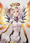  1girl blonde_hair blue_eyes bodysuit character_name cowboy_shot grey_background high_ponytail highres looking_at_viewer mechanical_halo mechanical_wings mercy_(overwatch) mousoup overwatch parted_lips simple_background smile solo wings 