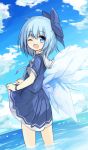  1girl ;d adapted_costume blush bow cirno fanning_crotch hair_bow ice ice_wings large_bow one_eye_closed open_mouth school_uniform serafuku short_hair skirt skirt_lift smile solo touhou wading water wings yuuhagi_(amaretto-no-natsu) 