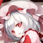  1girl alternate_costume blue_hair blush bow commentary_request dress eyelashes fang frilled_sleeves frills hat large_eyes looking_at_viewer lying open_mouth pointy_ears red_bow red_dress red_eyes remilia_scarlet smile solo touhou utakata_(kochou_no_yume) 