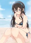  1girl bangs beach bikini black-framed_glasses black_hair blue_bikini blue_eyes blush breast_hold breasts cleavage closed_mouth collarbone eyebrows eyebrows_visible_through_hair glasses hair_between_eyes hairband halterneck jiino kantai_collection long_hair looking_at_viewer ocean on_ground ooyodo_(kantai_collection) sand semi-rimless_glasses side-tie_bikini sitting sky small_breasts smile solo stomach swimsuit under-rim_glasses 
