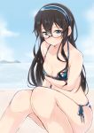  1girl bikini black_hair blue_eyes blush breast_hold breasts cleavage glasses hairband jiino kantai_collection long_hair looking_at_viewer ooyodo_(kantai_collection) side-tie_bikini sitting small_breasts smile solo swimsuit 