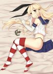  1girl absurdres anchor blonde_hair commentary elbow_gloves eyebrows eyebrows_visible_through_hair full_body gloves highres hips kantai_collection long_hair looking_at_viewer miniskirt reclining rudestewing shimakaze_(kantai_collection) skirt solo striped striped_legwear white_gloves yellow_eyes 