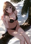  1girl arm_at_side bangs beach bikini black_bikini blue_eyes blush breasts brown_hair cleavage collarbone dappled_sunlight eyebrows eyebrows_visible_through_hair from_above green_eyes hand_up heterochromia holding idolmaster idolmaster_cinderella_girls in_tree kurokin looking_at_viewer medium_breasts mole mole_under_eye multi-strapped_bikini navel o-ring_bikini o-ring_top outdoors palm_tree parted_lips shade short_hair sitting smile solo stomach string_bikini sunlight swimsuit takagaki_kaede towel tree tree_shade 