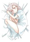  1girl bed bed_sheet blush eyebrows eyebrows_visible_through_hair highres loose_socks misaka_mikoto no_pants puma_(hyuma1219) red_eyes shirt socks solo to_aru_kagaku_no_railgun to_aru_majutsu_no_index white_hair white_shirt 