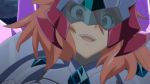  1girl amou_kanade armor eyebrows eyebrows_visible_through_hair grin headgear looking_at_viewer lowres messy_hair open_mouth pauldrons photoshop red_eyes redhead senki_zesshou_symphogear smile solo spikes visor 