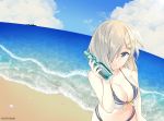  1girl bare_shoulders beach bikini blue_eyes blue_sky bottle breasts cleavage clouds cloudy_sky coast collarbone hair_ornament hair_over_one_eye hairclip hamakaze_(kantai_collection) kantai_collection large_breasts lips looking_at_viewer mimamui ocean ramune sand ship short_hair silver_hair sky smile solo swimsuit twitter_username water water_bottle watercraft wet wet_hair 