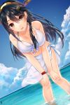  1girl bare_shoulders bikini black_hair breasts clouds cloudy_sky dutch_angle hair_ornament hairband hairclip halter_top halterneck hands_on_own_knees haruna_(kantai_collection) highres jun_project kantai_collection leaning_forward long_hair medium_breasts midriff ocean outdoors sarong sky solo standing standing_on_liquid swimsuit white_bikini 