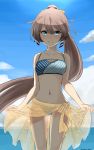  10eki_(tenchou) 1girl ass_visible_through_thighs bare_shoulders bikini blue_eyes blue_sky blush brown_hair clouds collarbone hair_ornament hair_ribbon highres kantai_collection kazagumo_(kantai_collection) long_hair looking_at_viewer navel polka_dot ponytail ribbon sky smile solo swimsuit thigh_gap thighs tsurime twitter_username water 