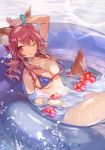  1girl animal_ears arm_up bikini blue_bikini bracelet breasts caster_(fate/extra) fate/grand_order fate_(series) flower fox_ears fox_tail hibiscus highres innertube jewelry long_hair low_ponytail medium_breasts micro_bikini nove_(legge) one_eye_closed partially_submerged pink_eyes pink_hair ponytail sitting smile solo strap_gap swimsuit tail water water_drop wet 