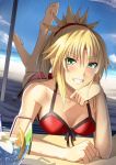  1girl barefoot beach beach_towel bendy_straw bikini blonde_hair blush breasts chin_rest cup drinking_straw fate/grand_order fate_(series) green_eyes grin hirame_sa looking_at_viewer lying ocean on_stomach red_bikini saber_of_red sand short_ponytail side-tie_bikini smile solo spiky_hair swimsuit the_pose water 