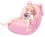 1girl bare_legs barefoot bean_bag_chair bike_shorts blonde_hair blush clothes_writing futaba_anzu handheld_game_console idolmaster idolmaster_cinderella_girls long_hair low_twintails lying mouth_hold nullken on_back playing_games playstation_vita shirt solo spread_legs striped striped_bike_shorts stuffed_animal stuffed_bunny stuffed_toy t-shirt twintails you_work_you_lose 