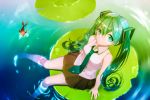  1girl fish from_above green_eyes green_hair hatsune_miku isozi lily_pad long_hair necktie sitting skirt soaking_feet solo twintails very_long_hair vocaloid water 