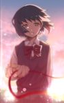  1girl bad_id black_hair furai highres kimi_no_na_wa looking_at_viewer miyamizu_mitsuha red_string school_uniform short_hair smile solo spoilers string 