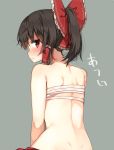  1girl alternate_hairstyle back bare_shoulders black_hair blush bow dimples_of_venus frills from_behind grey_background hair_bow hair_tubes hakurei_reimu looking_at_viewer looking_back nape ponytail profile red_bow red_eyes sarashi shinoba simple_background solo sweat touhou 