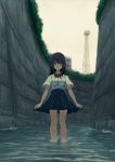  1girl bangs black_hair blue_skirt bow bowtie breasts building closed_mouth commentary day expressionless highres long_hair looking_at_viewer medium_breasts original outdoors pleated_skirt red_bow red_bowtie school_uniform short_sleeves sidelocks skirt skirt_hold sky solo standing tabisora tower violet_eyes wading water 