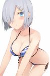  1girl alternate_costume bare_shoulders bikini blue_eyes breasts cleavage closed_mouth cole commentary_request hair_ornament hair_over_one_eye hairclip hamakaze_(kantai_collection) kantai_collection large_breasts looking_at_viewer simple_background solo striped striped_bikini striped_swimsuit swimsuit white_background white_hair 
