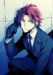  1boy alternate_costume black_gloves collared_shirt ensemble_stars! formal gloves green_eyes gun headset holding holding_weapon isara_mao kneeling looking_up male_focus necktie parted_lips pink_hair shirt solo suit wall weapon xia_(ryugo) 