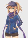  1girl ahoge baseball_cap blonde_hair blue_jacket blue_scarf breasts brown_shorts cowboy_shot fate/grand_order fate/stay_night fate_(series) green_eyes grey_background hair_between_eyes hair_intakes hands_in_pockets hat heroine_x jacket long_hair medium_breasts okakan ponytail saber scarf shorts simple_background solo track_jacket wristband 