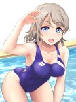  1girl arm_up blue_eyes blue_swimsuit blush breasts brown_hair competition_swimsuit covered_navel highres inanaki_shiki looking_at_viewer love_live! love_live!_sunshine!! one-piece_swimsuit open_mouth pool salute short_hair smile solo swimsuit watanabe_you water wet 