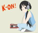  akiyama_mio bare_shoulders black_eyes black_hair headphones k-on! pajamas sitting solo stereo wink 